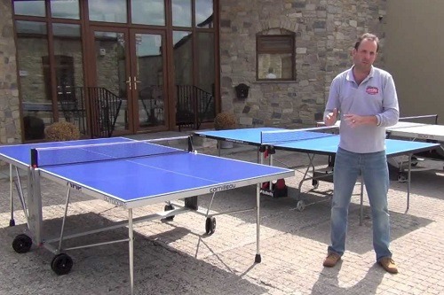 Man Standing Next To Different Ping Pong Tables